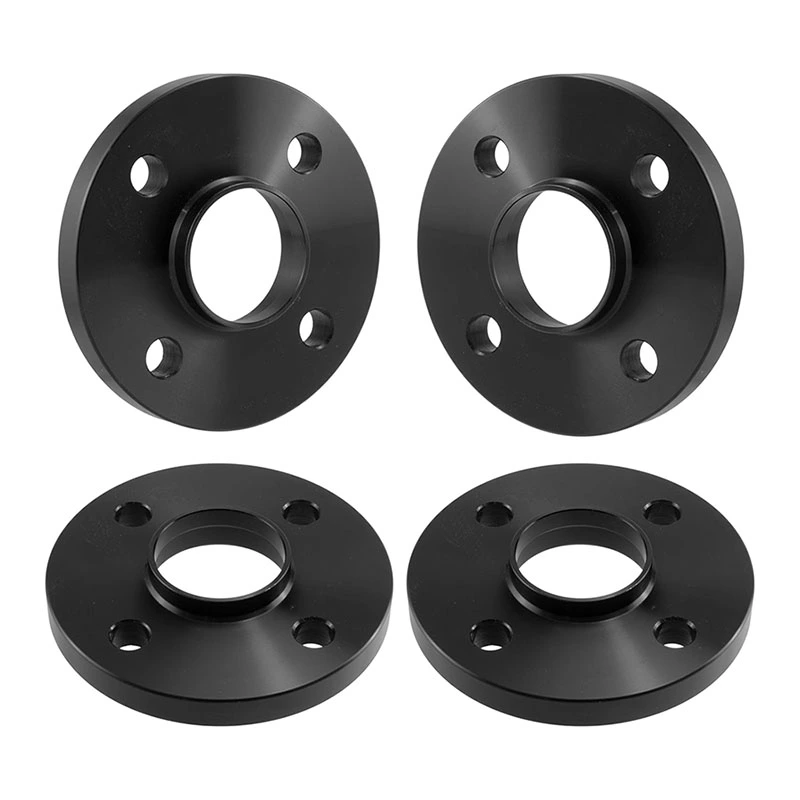 Black hub-centric slip-on spacers showing the wheel-side locating lips