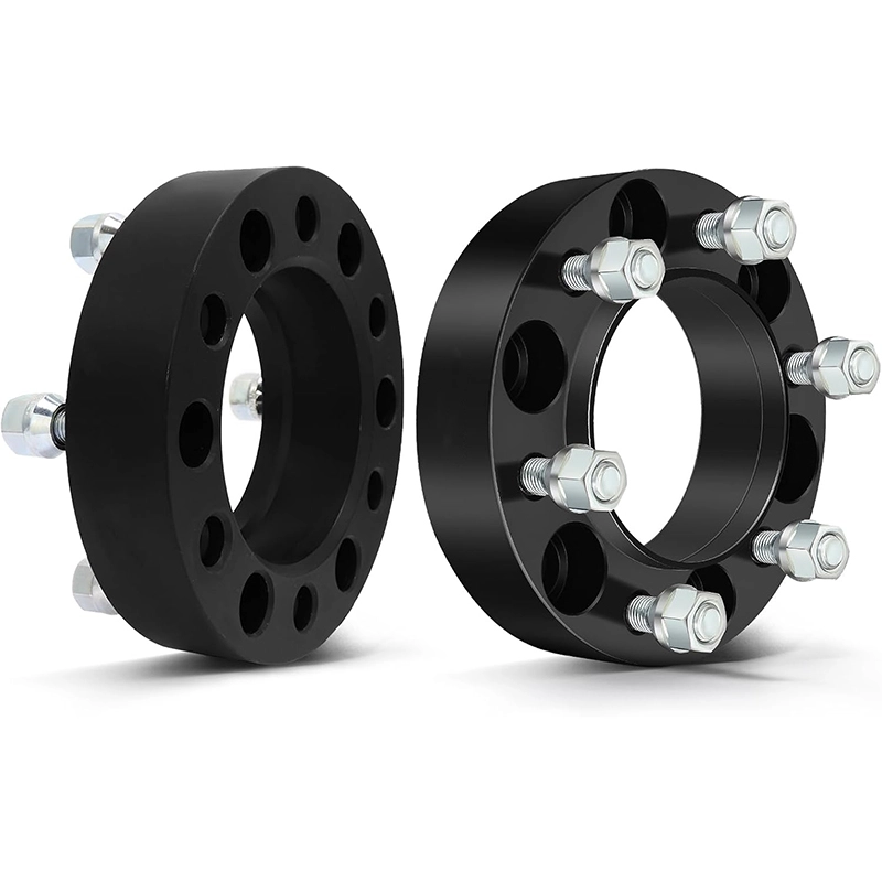 Wheel-side and hub-side views of two black spacer adapters