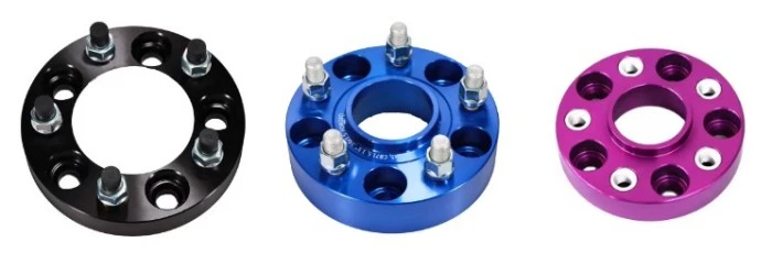 Black blue and purple wheel spacers in different attachment formats