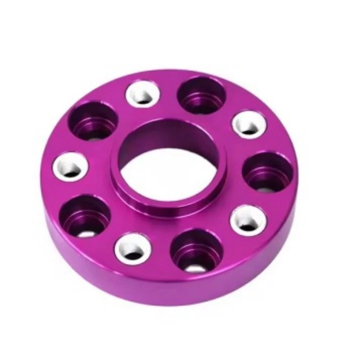 Purple hub-centric wheel spacer adapter with two fastening patterns